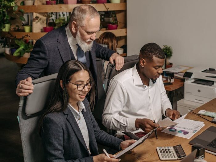 Three People Working in the Office