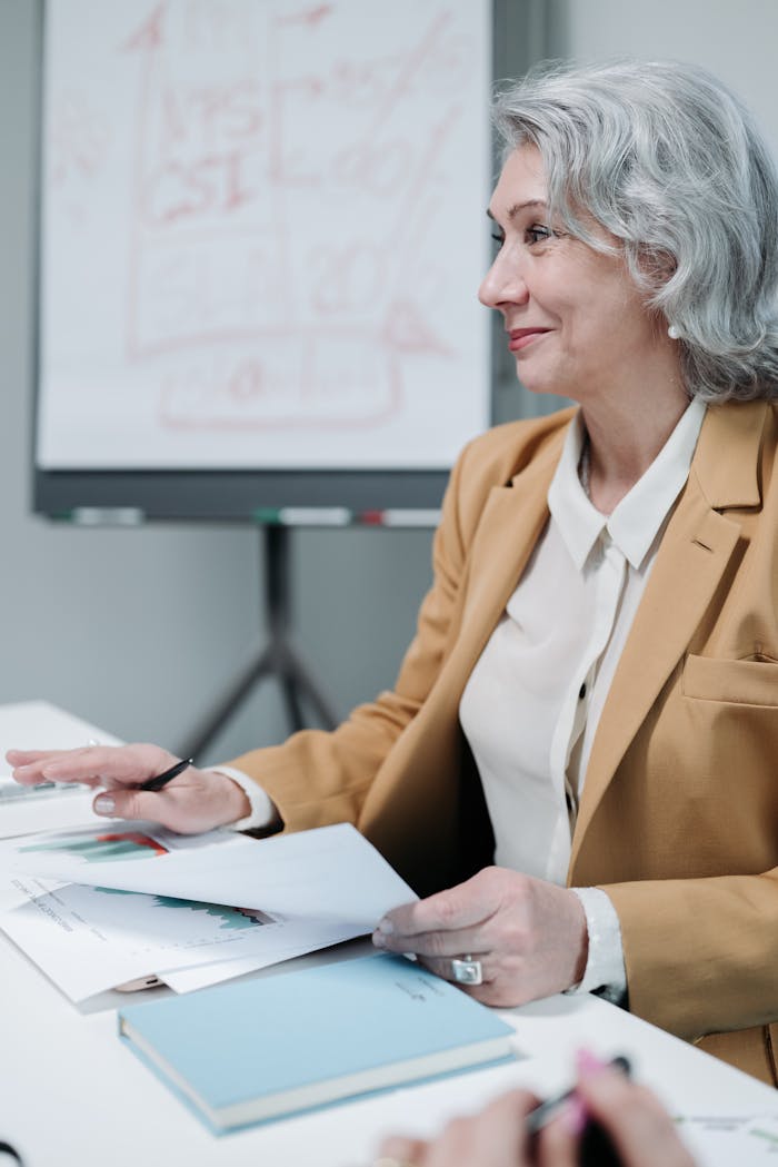 A Woman Wearing a Blazer during a Meeting